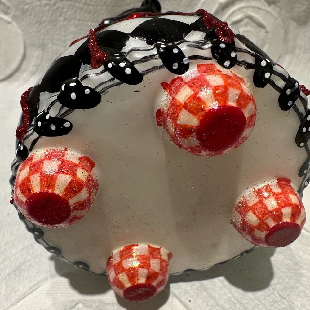 MacKenzie-Childs Glass Black and White Skunk Ornament with Red Accents - Picture 4 of 7